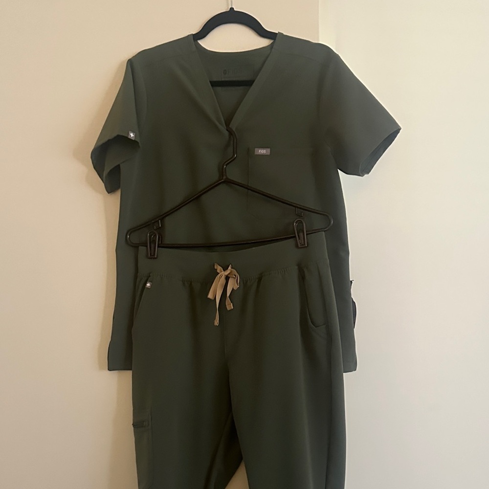Figs Dark Green Women's scrubs, color Moss, both of them medium